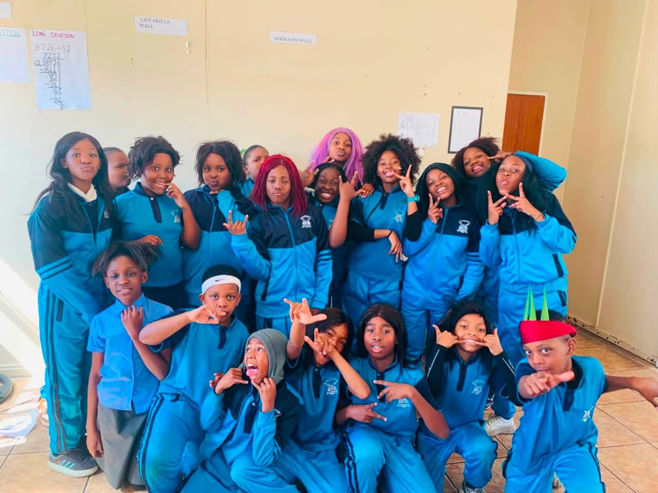 Advanced College learners gathered together in school sportswear