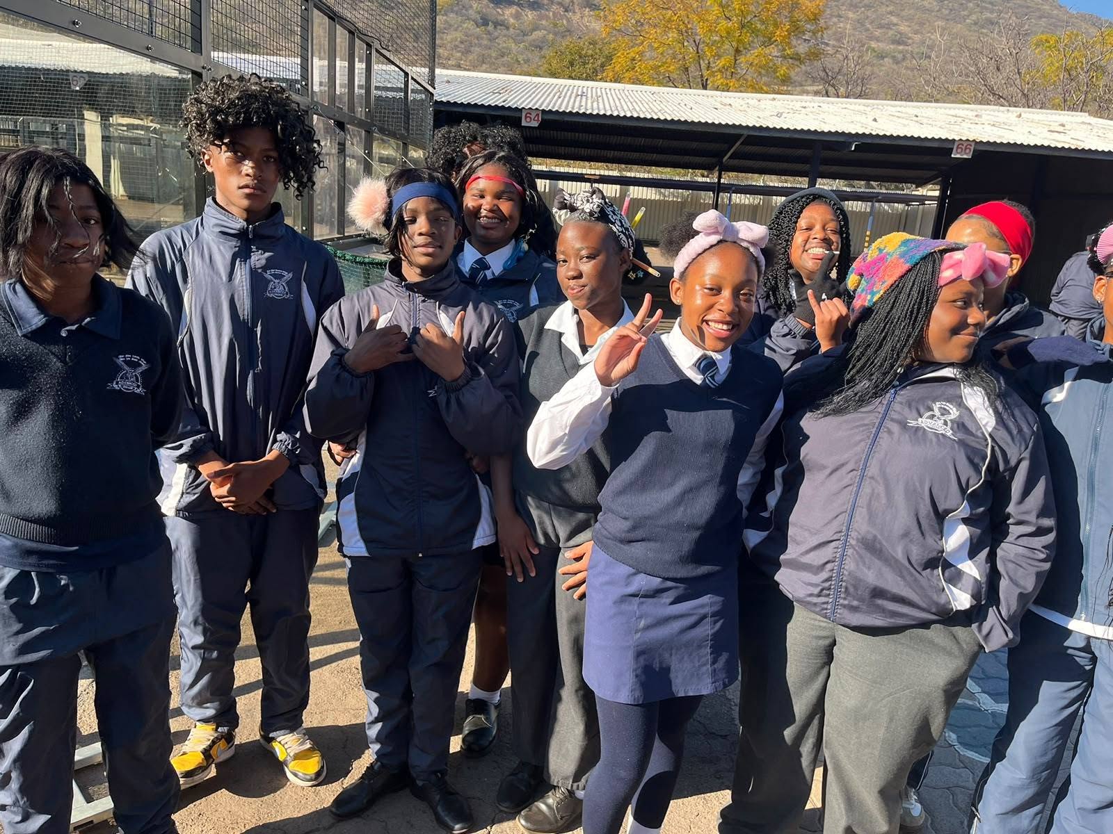 Advanced College learners gathered together outdoors