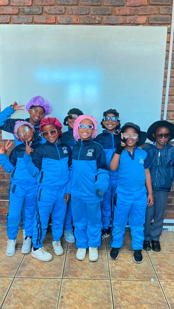 Advanced College learners gathered together in school sportswear